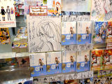 発売時のCOMIC ZIN、イラスト入りサイン色紙も展示
